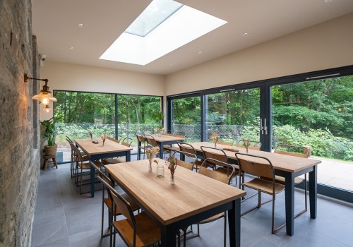 Cornerstone Table seating by windows